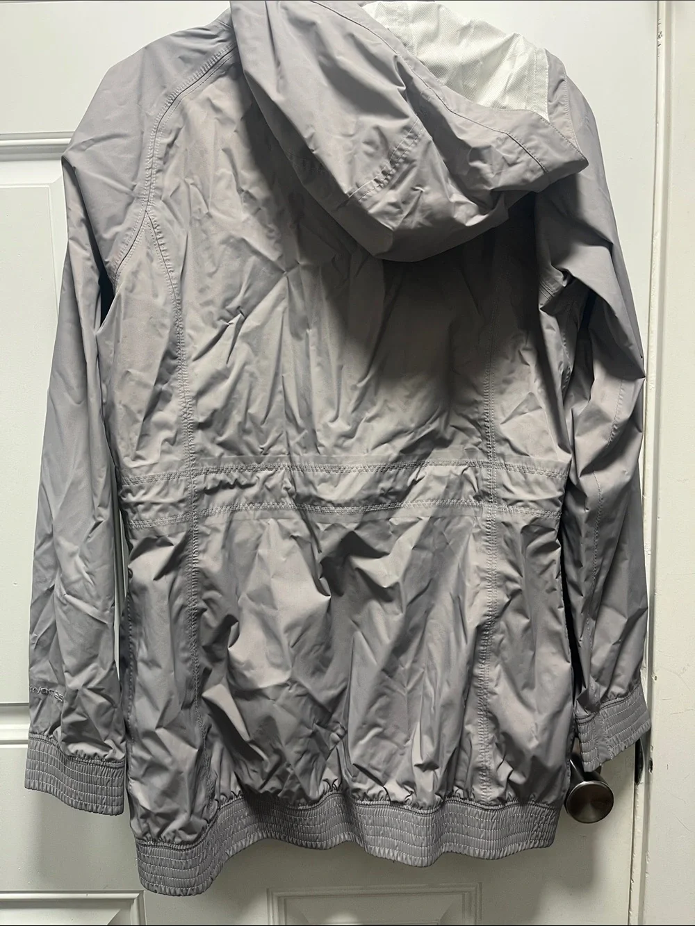 The North Face Light Gray women’s' Hooded Rain Jacket
